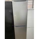 A SILVER UPRIGHT HOTPOINT FRIDGE FREEZER