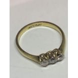 AN 18 CARAT GOLD RING WITH THREE IN LINE DIAMONDS SIZE N IN A PRESENTATION BOX