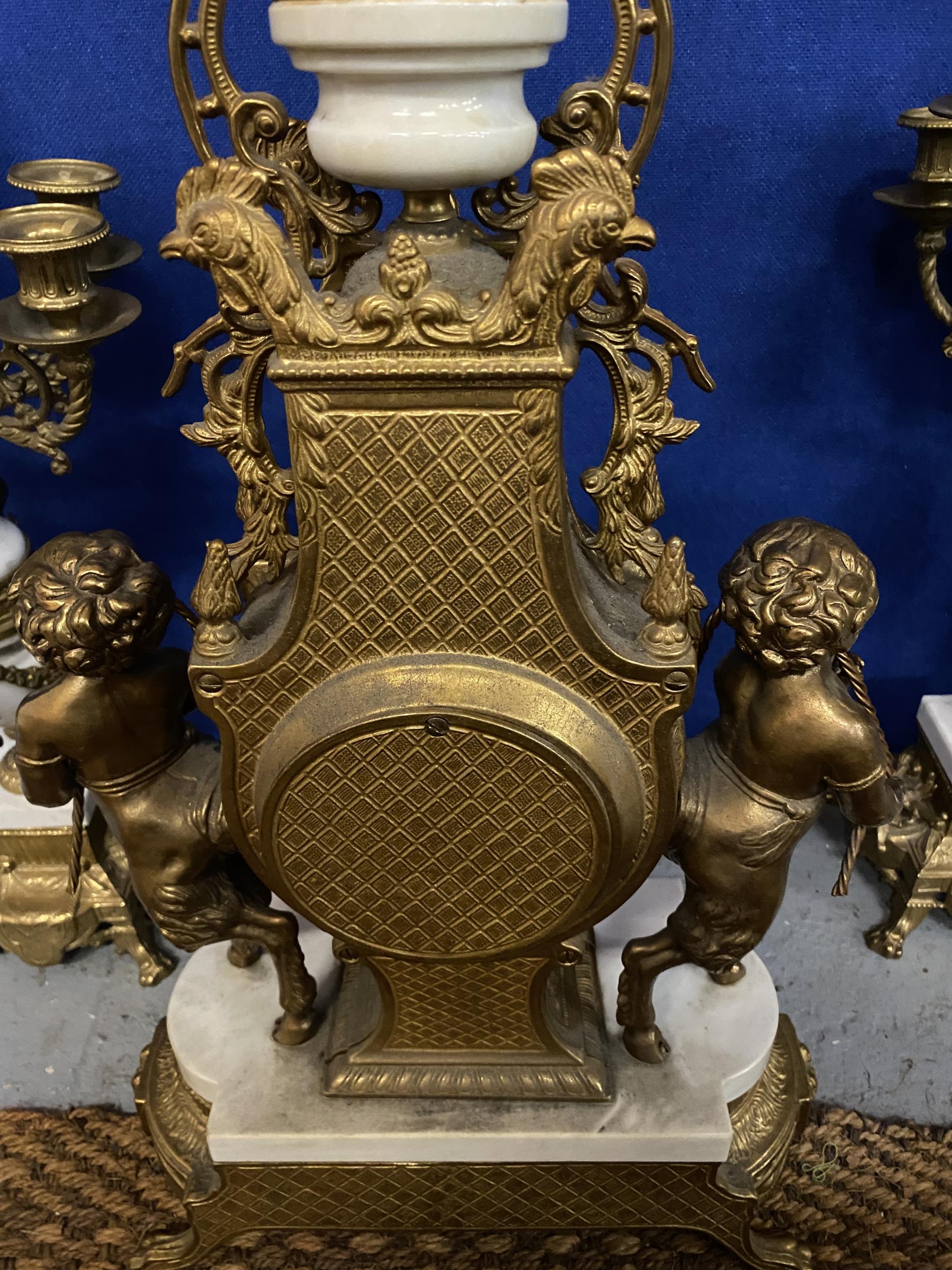 AN ORNATE IMPERIAL FRENCH GILT MANTLE CLOCK ON A MARBLE AND GILT BASE WITH CHERUB FAWN DECORATION - Image 10 of 10