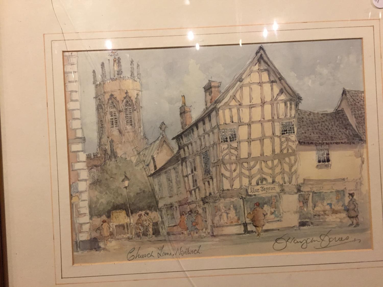 A FRAMED PRINT OF CHURCH LANE, NANTWICH, SIGNED TO THE BOTTOM RIGHT (GLASS A/F) - Image 2 of 2