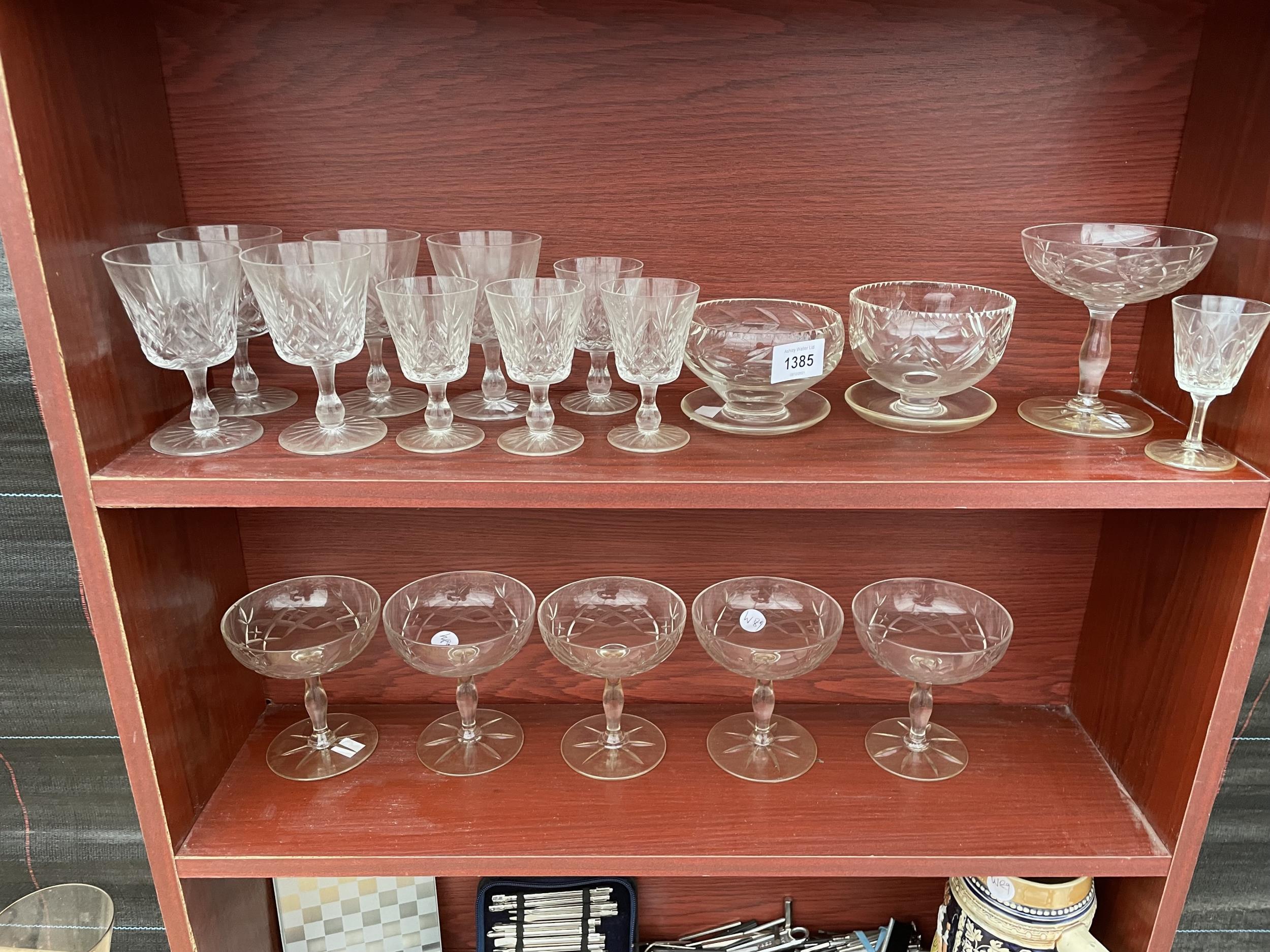 AN ASSORTMENT OF GLASS WARE TO INCLUDE SHERRY GLASSES AND DESSERT BOWLS ETC