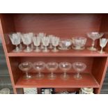 AN ASSORTMENT OF GLASS WARE TO INCLUDE SHERRY GLASSES AND DESSERT BOWLS ETC