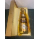 A BOXED BOTTLE OF MARQUE DEPOSEE LOUIS ROEDERER CRISTAL 1990 CHAMPAGNE