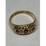 AN 18 CARAT GOLD RING WITH FIVE IN LINE STONES THREE RUBYS AND TWO DIAMONDS IN A DECORATIVE