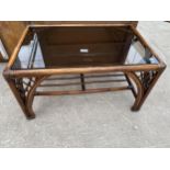 A BAMBOO GLASS TOP COFFEE TABLE