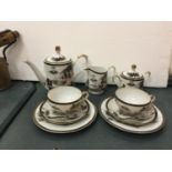 AN ORIENTAL TEASET COMPRISING OF CUPS, SAUCERS, SIDE PLATES, TEAPOT, MILK JUG AND SUGAR BOWL.