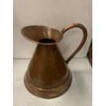 A VINTAGE LARGE COPPER JUG