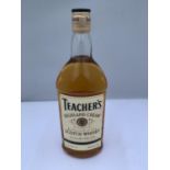 A 1 LITRE BOTTLE OF TEACHERS HIGHLAND CREAM PERFECTION OF OLD SCOTCH WHISKY 40% VOLUME