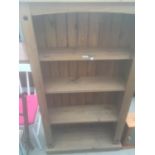 A MODERN OPEN PINE BOOKCASE 33 INCHES WIDE