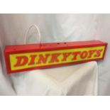 AN ILLUMINATED DINKY TOYS SIGN