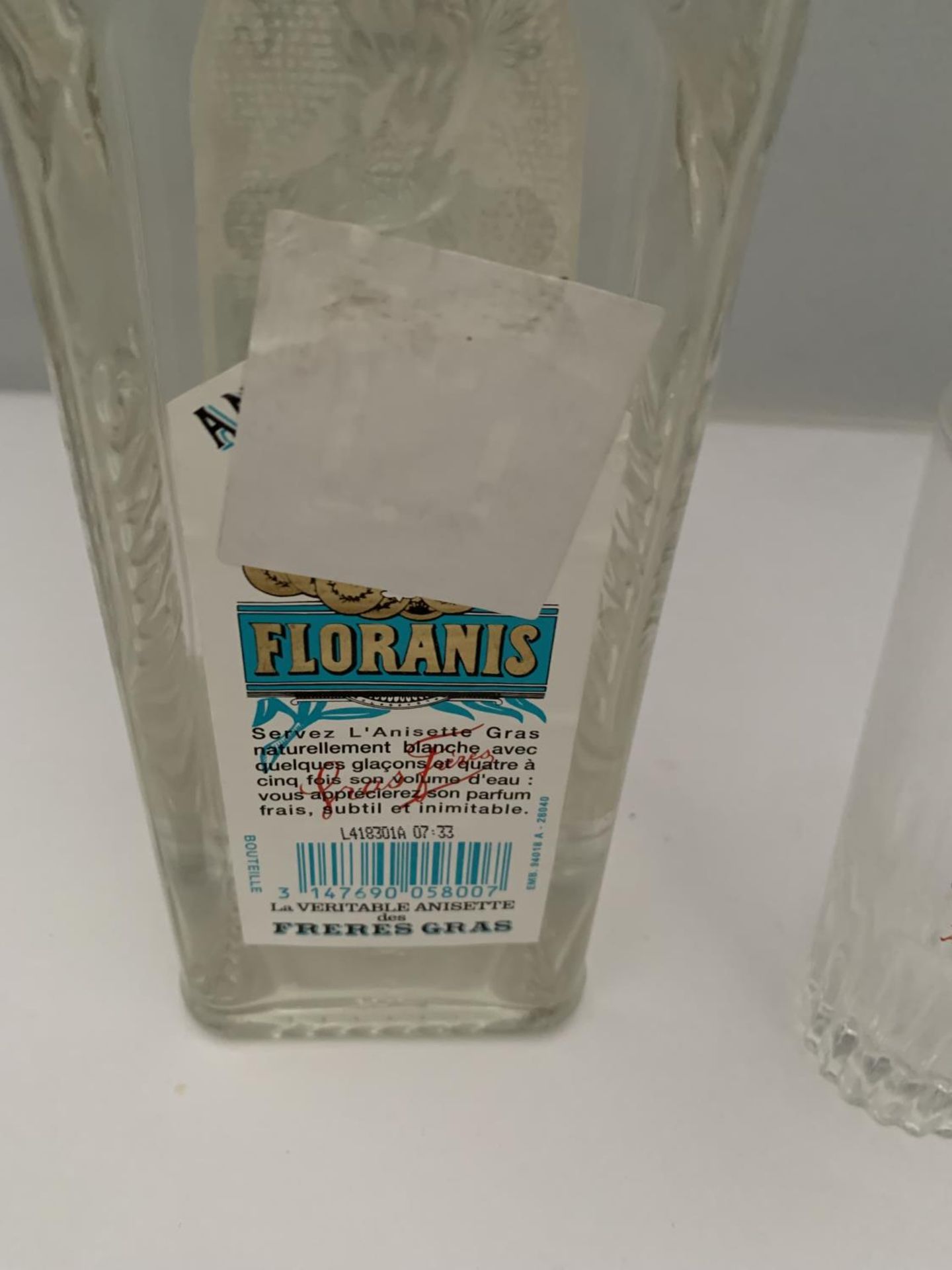 A LITRE BOTTLE OF ANISETTE GRAS 1872 FLORANIS EXPORT PERITIF ANISE 45% VOL WITH AN ANIS GRAS GLASS - Image 4 of 4