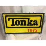 AN ILLUMINATED TONKA TOYS SIGN