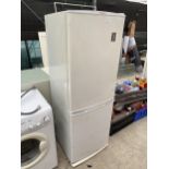 A WHITE DAEWOO UPRIGHT FRIDGE FREEZER