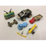 SIX VINTAGE TIN PLATE FRICTION VEHICLES