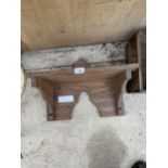 A SOLID OAK SHELF RECLAIMED FROM A CHURCH