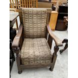 AN EARLY 20TH CENTURY OAK RECLINER CHAIR WITH TURNED AND FLUTED UPRIGHTS