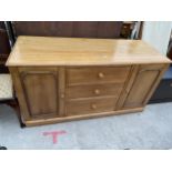 A VICTORIAN PINE KITCHEN SIDEBOARD ENCLOSING THREE DRAWERS AND TWO CUPBOARDS, 60" WIDE