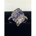 A 9 CARAT WHITE GOLD AMETHYST AND DIAMOND RING SIZE M/N IN A PRESENTATION BOX