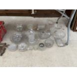 AN ASSORTMENT OF CUT GLASS ITEMS TO INCLUDE VASES, CAKE STANDS AND BOWLS ETC
