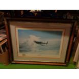A WOODEN FRAMED PRINT OF A SPITFIRE ENTITLED 'REACH FOR THE SKIES', GROUP CAPTAIN SIR DOUGLAS BADER,