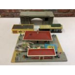 A COLLECTION OF OO GAUGE MODEL RAILWAY BUILDINGS TO INCLUDE A STATION AND A BRIDGE