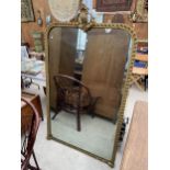 A 19TH CENTURY GILT FRAMED OVERMANTEL MIRROR, 68 X 39"