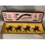 A BOXED BRITIANS THE DUKE OF CAMBRIDGE'S OWN 17TH LANCERS FOUR PIECE HORSE MOUNTED MODEL SOLDIER SET