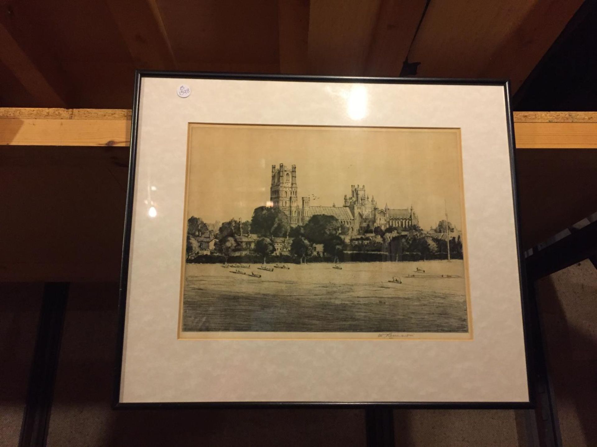 A SIGNED PICTURE OF A CHURCH WITH GRAZING SHEEP IN THE FOREGROUND. INDISTINCT SIGNATURE