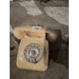 A RETRO CREAM ROTARY DIAL TELEPHONE