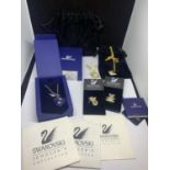 SIX ITEMS OF SWAROVSKI CRYSTAL TO INCLUDE TWO NECKLACES AND FOUR PIN BADGES SOME WITH BOX OR BAGS