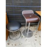 AN ADJUSTABLE KITCHEN STOOL WITH S-FRAME SEAT, BEARING LABEL LAPALMA, MADE IN ITALY AND A TUBULAR