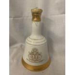 A BELL'S SCOTCH WHISKY PERTH SCOTLAND 40% VOL 50CL IN A COMMEMORATIVE PORCELAIN DECANTER TO