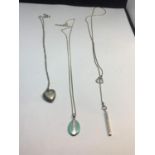 THREE MARKED SILVER NECKLACES WITH PENDANTS TO INCLUDE A HEART LOCKET ETC