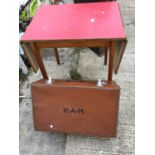 A FORMICA DROP LEAF TABLE AND A SUITCASE