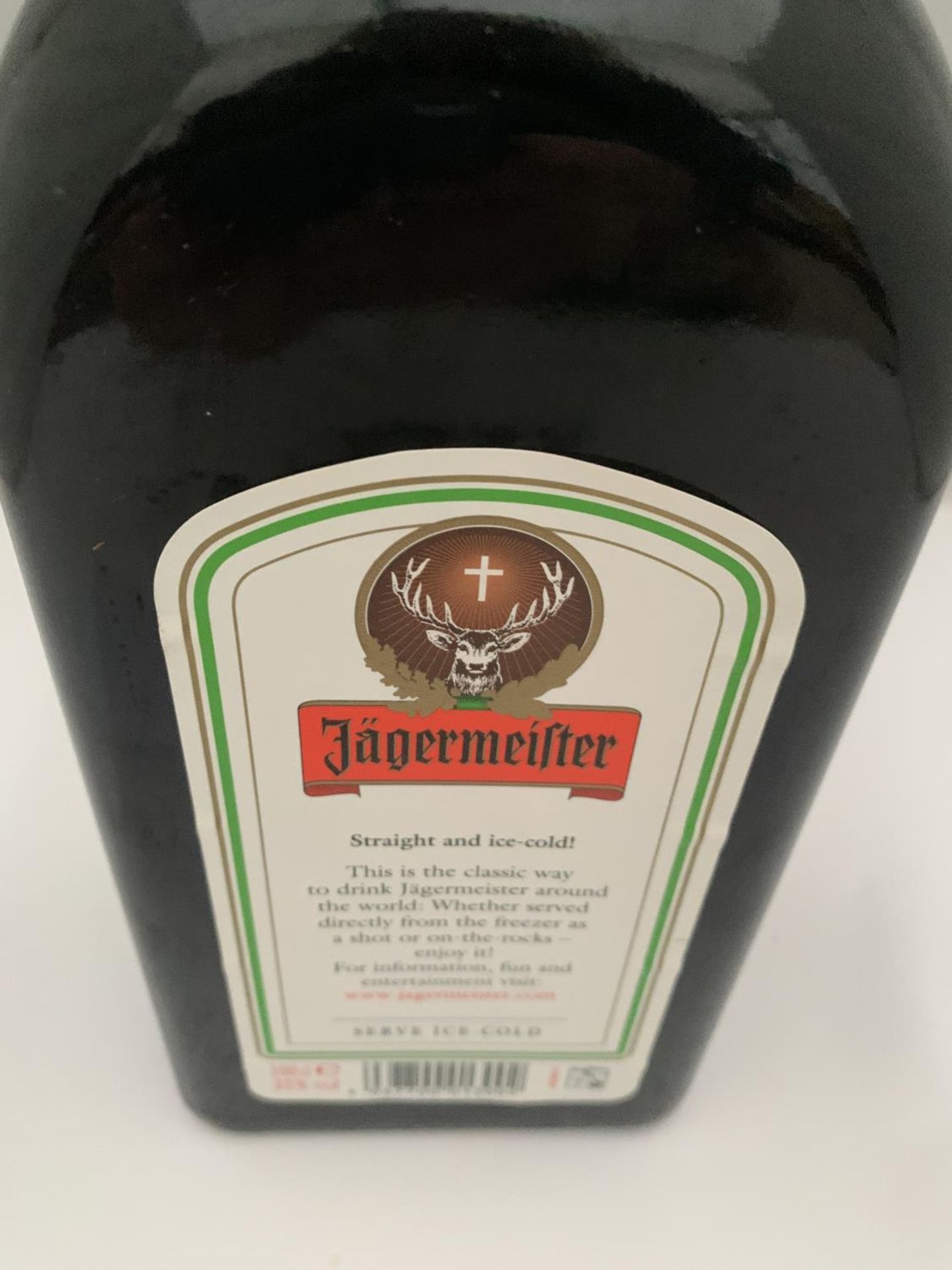 A 1 LITRE BOTTLE OF JAGERMEISTER 35% VOL - Image 3 of 3