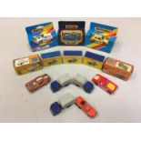 A COLLECTION OF BOXED AND UNBOXED MATCHBOX VEHICLES - ALL MODEL NUMBER 15 OF VARIOUS ERAS AND