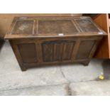 A REPRODUCTION OAK BLANKET CHEST WITH LINENFOLD PANEL, 36" WIDE