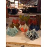 A COLLECTION OF PATTERNED HANDKERCHIEF GLASS BOWLS TO INCLUDE A LARGE ONE