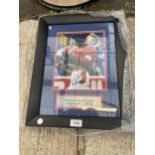 AN AUTOGRAPHED AND FRAMED DAVID BECKHAM PICTURE