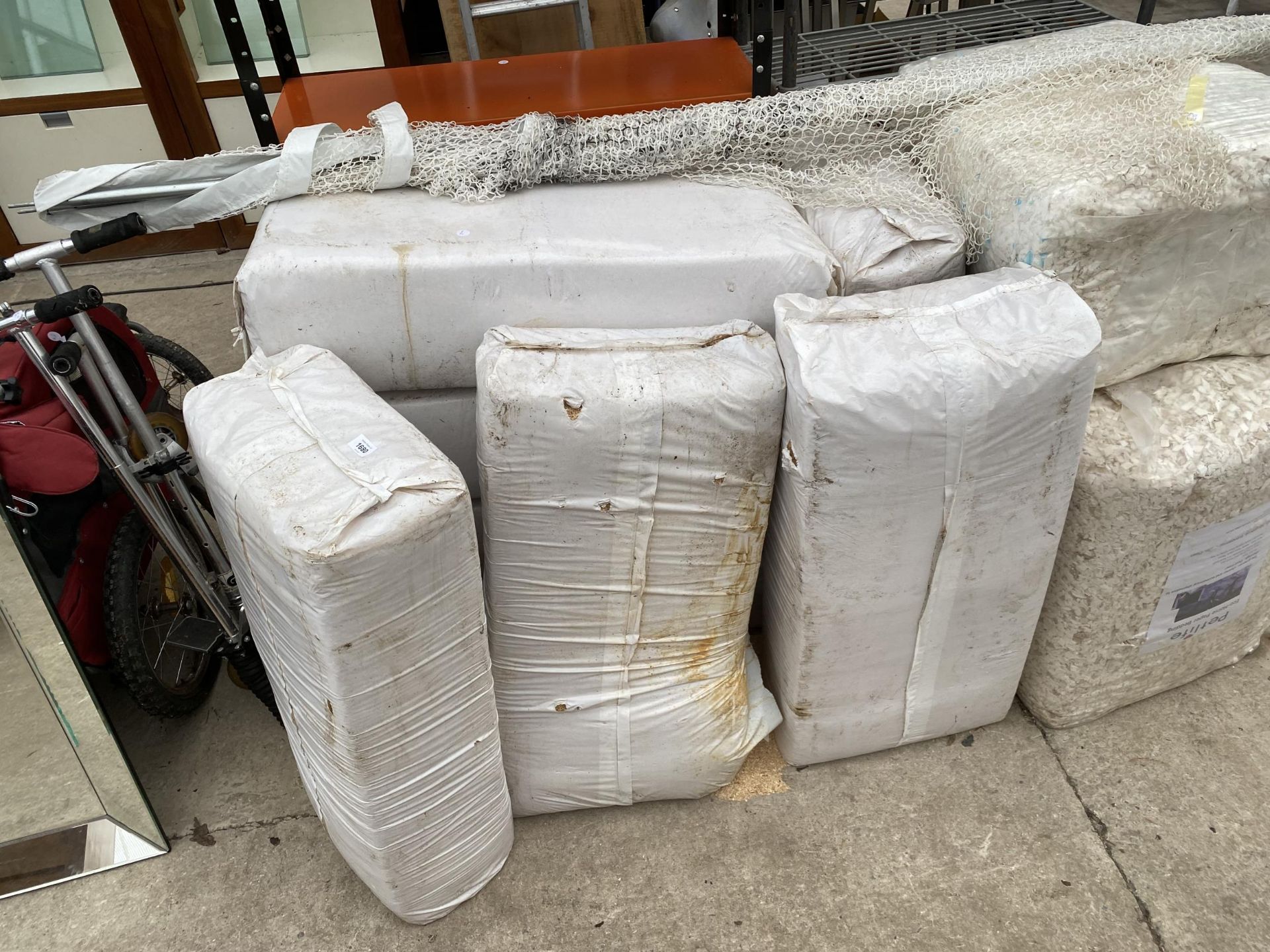 A LARGE QUANTITY OF BAGGED SAWDUST