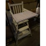 A WHITE PAINTED METAMORPHIC CHILDS HIGH CHAIR