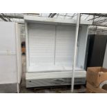 A LARGE SHOP CHILLER CABINET