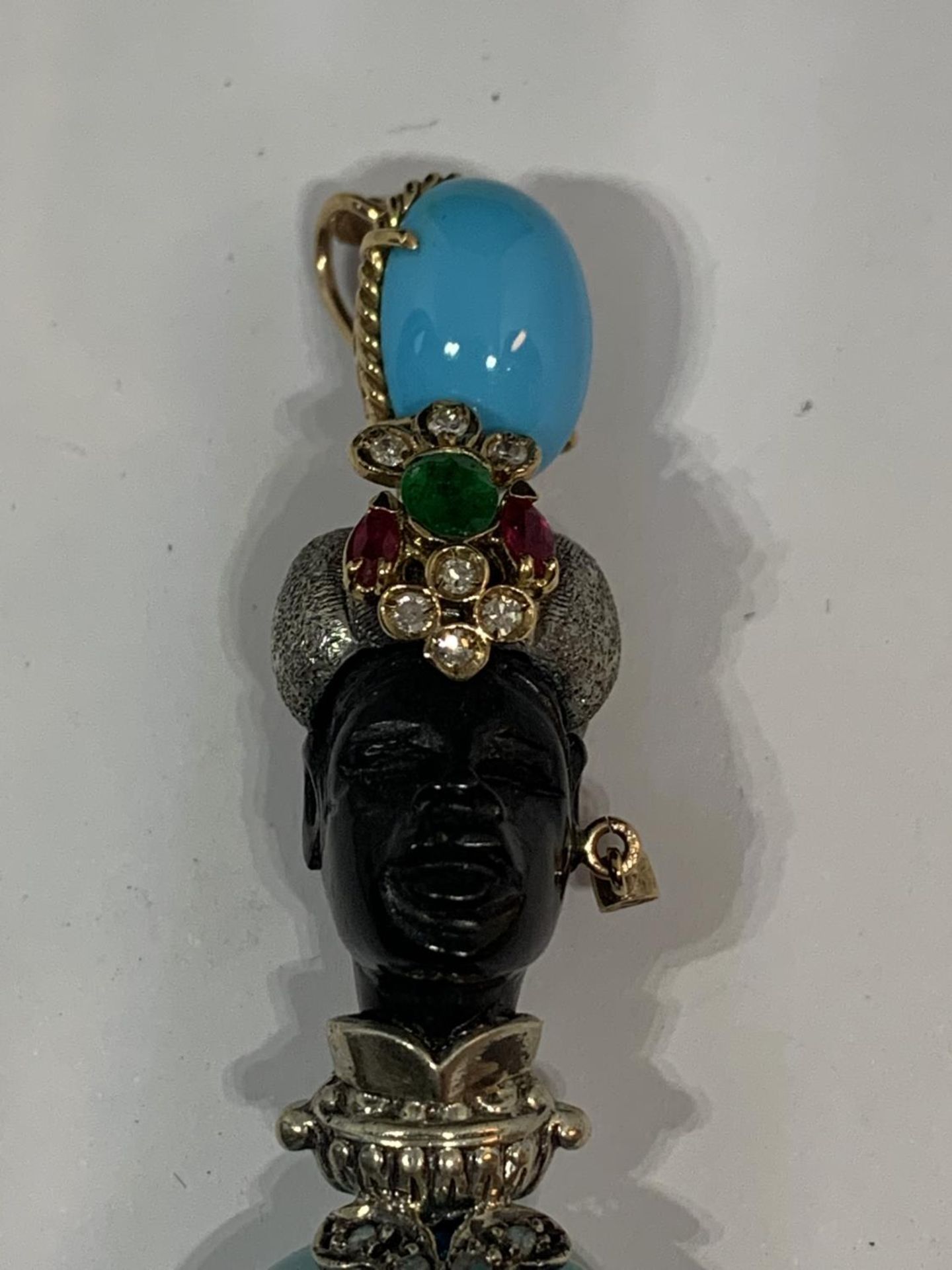 A BLACKAMORE PENDANT OF AN AFRICAN TRIBAL FIGURE WITH RUBYS, EMERALDS AND TURQUOISE STONES BY - Image 2 of 5