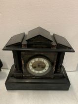A SLATE MANTLE CLOCK WITH COLUMNS AND A FRENCH MOVEMENT