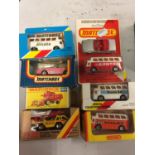 A COLLECTION OF BOXED AND UNBOXED MATCHBOX VEHICLES - ALL MODEL NUMBER 65 OF VARIOUS ERAS AND