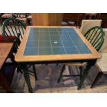 A MODERN TILED TOP KITCHEN TABLE AND TWO CHAIRS, 35" SQUARE