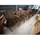 A SET OF SIX MACINTOSH TEAK DINING CHAIRS WITH BUTTON BACK AND SEATS, TWO BEING CARVER