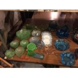 A LARGE AMOUNT OF GLASSWARE TO INCLUDE LEAF SHAPED GREEN BOWLS, BLUE BASKETS, PLATES, ETC