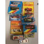 A COLLECTION OF BOXED AND UNBOXED MATCHBOX VEHICLES - ALL MODEL NUMBER 51 OF VARIOUS ERAS AND