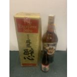 A BOXED BOTTLE OF THE EXCELLENT SAKE